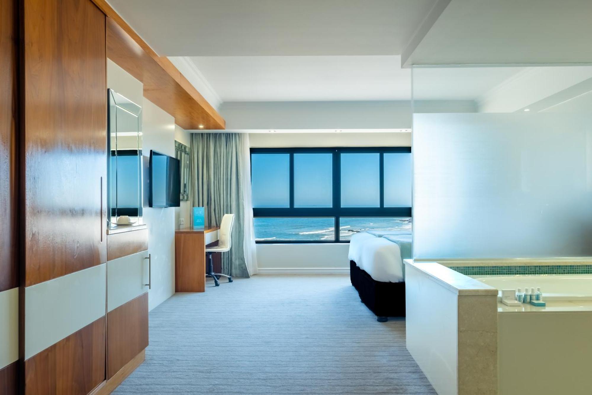 Blaauwberg Beach Hotel بلوبيرجستراند المظهر الخارجي الصورة