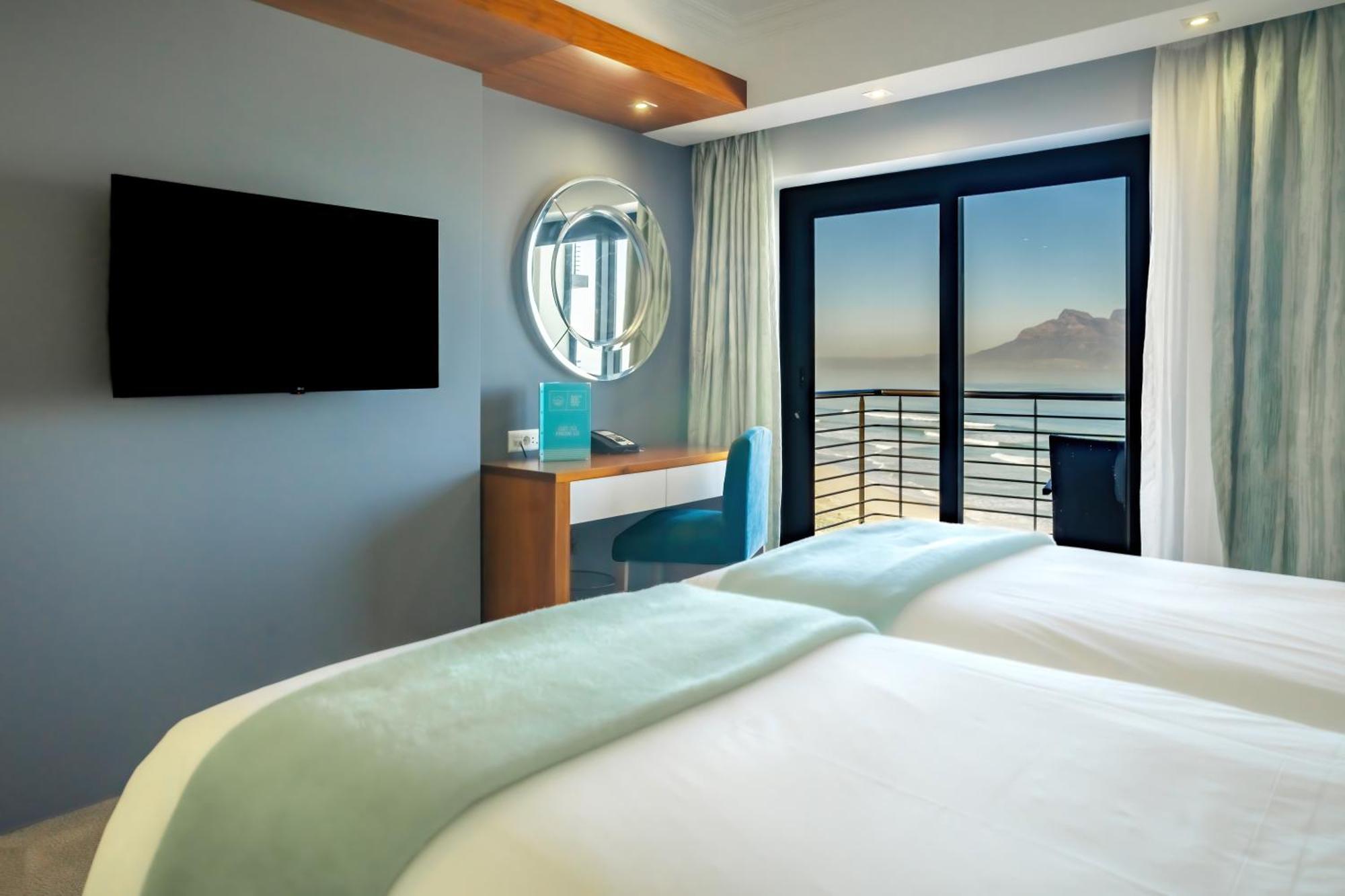 Blaauwberg Beach Hotel بلوبيرجستراند المظهر الخارجي الصورة
