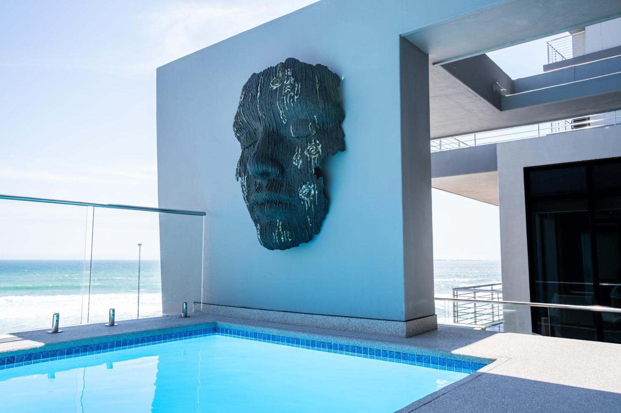 Blaauwberg Beach Hotel بلوبيرجستراند المظهر الخارجي الصورة